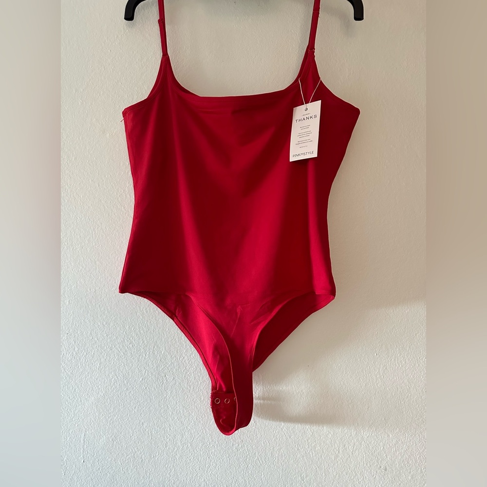 Pinkm style red bodysuit size XL, new with tags.